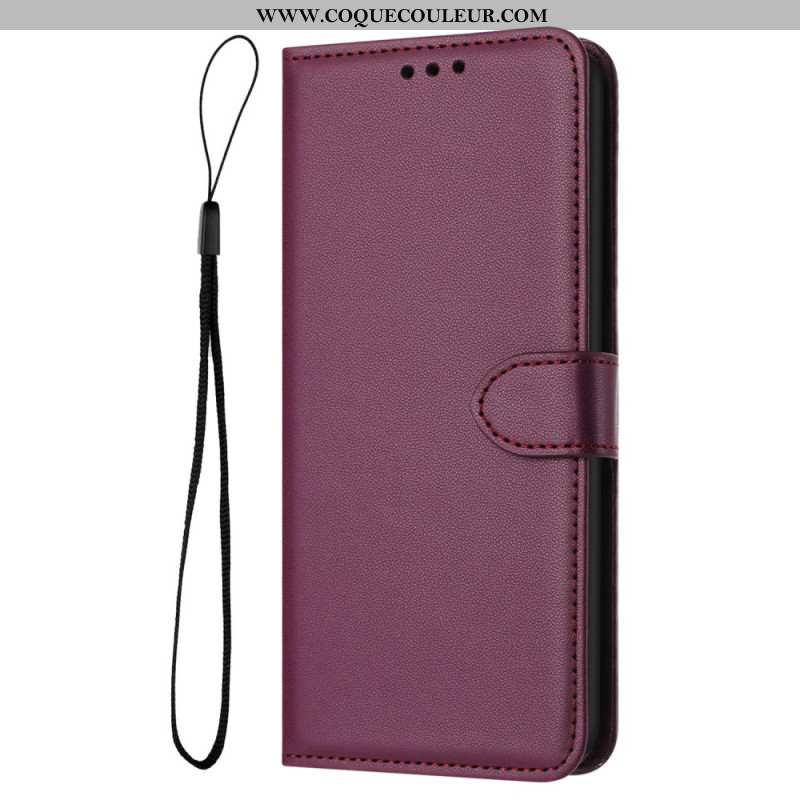 Housse iPhone 16 Plus Style Cuir Uni à Lanière